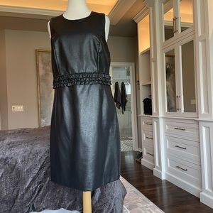 Black faux leather dress.